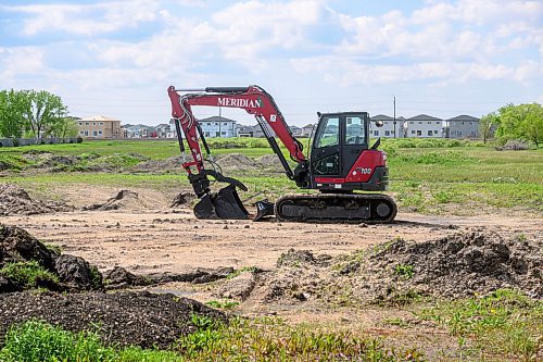 Mike Sudoma/Free Press
In development houses sit in the distance behind an excavator on a plot of undeveloped land in Meadowlands Place a newly developed housing development located just outside the city in West St Paul
May 31, 2024