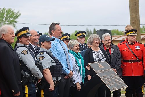 Family members of Constable Dennis A. Onofrey — his wife Paula and son Corey (middle) — travelled from Vancouver to attend a ceremony dedicating the Seventh Avenue bridge to the Mountie who was shot and killed in 1978. (Geena Mortfield/The Brandon Sun)