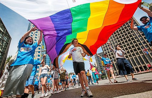 Downtown Winnipeg was flooded with colour Sunday as thousands took to the streets in celebration of the city’s annual LGBTTQ+ Pride parade. (Photos by John Woods/Winnipeg Free Press)