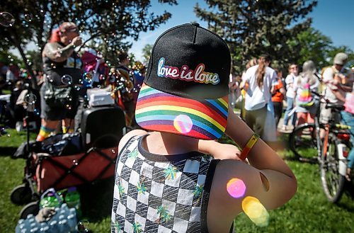 JOHN WOODS / FREE PRESS
James catches bubbles as people attend Pride parade in Winnipeg Sunday, June 2, 2024. 

Reporter: tyler