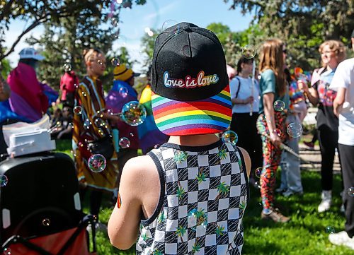 JOHN WOODS / FREE PRESS
James catches bubbles as people attend Pride parade in Winnipeg Sunday, June 2, 2024. 

Reporter: tyler