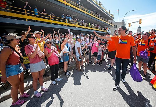 JOHN WOODS / FREE PRESS
Wab Kinew waves to the people as they attend Pride parade in Winnipeg Sunday, June 2, 2024. 

Reporter: tyler