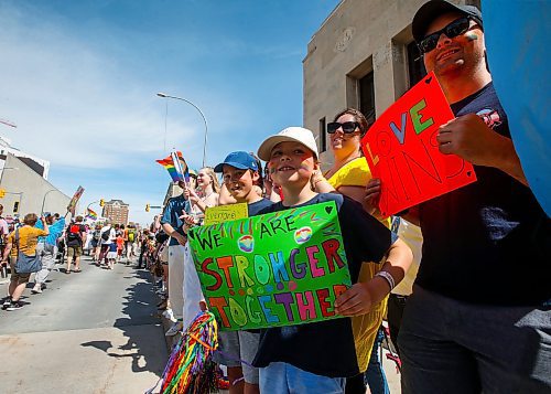 JOHN WOODS / FREE PRESS
Aubrey and her family hold signs as people attend Pride parade in Winnipeg Sunday, June 2, 2024. 

Reporter: tyler