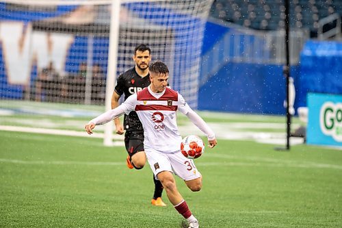 BROOK JONES / FREE PRESS.
Valour FC hosts visiting Vancouver FC in Canadian Premier League soccer action at Princess Auto Stadium in Winnipeg, Man., Sunday, June 2, 2024. Valour FC earned a 2-0 victory over Vancouver FC. Pictured: Valour FC defender Themi Antonoglou (No. 30) prepares to kick the soccer ball during first half action.