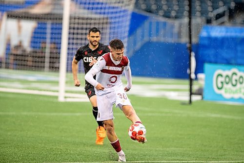 BROOK JONES / FREE PRESS.
Valour FC hosts visiting Vancouver FC in Canadian Premier League soccer action at Princess Auto Stadium in Winnipeg, Man., Sunday, June 2, 2024. Valour FC earned a 2-0 victory over Vancouver FC. Pictured: Valour FC defender Themi Antonoglou (No. 30) kicks the soccer ball during first half action.