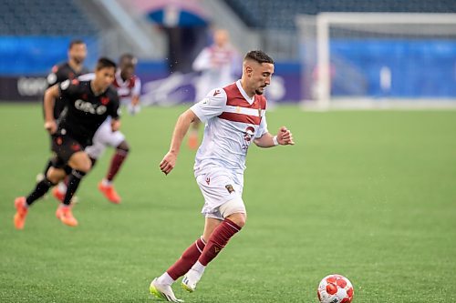 BROOK JONES / FREE PRESS.
Valour FC hosts visiting Vancouver FC in Canadian Premier League soccer action at Princess Auto Stadium in Winnipeg, Man., Sunday, June 2, 2024. Valour FC earned a 2-0 victory over Vancouver FC. Pictured: Valour FC defender Roberto Alarcon controls the soccer ball during second half action.