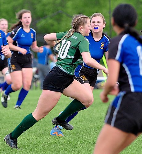 Dauphin Clippers fly-half Bree Walker (10) sees a gap in the Souris Sabres defence during the provincial final, scoring one of her three tries on this play. (Photos by Jules Xavier/The Brandon Sun)