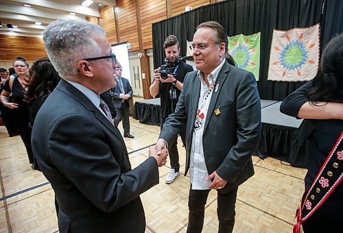 JOHN WOODS / FREE PRESS
President Michael Benarroch speaks to Grand Chief Garrison Settee after a rematriation and repatriation apology event at the University of Manitoba  (U of MB) in Winnipeg Monday, June 3, 2024. President Michael Benarroch apologized for U of MB&#x2019;s history related to the inappropriate acquisition and housing of First Nations, Inuit and M&#xe9;tis ancestral remains, burial belongings, and cultural heritage without consent.

Reporter: nicole