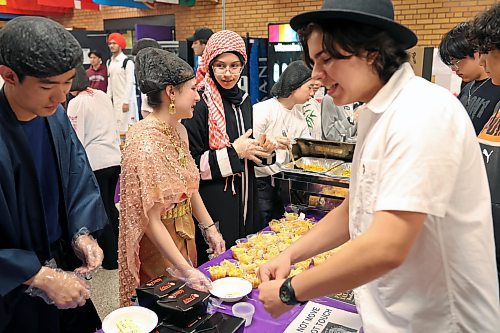 03062024
Foods from around the world are served during Culturama at Vincent Massey High School on Monday. The two-day event showcases and celebrates the wide variety of cultural backgrounds that make up the student population at the high school and includes performances and cuisine from culture&#x2019;s around the world. 
(Tim Smith/The Brandon Sun)