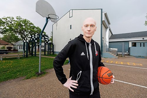 MIKE DEAL / FREE PRESS
Jeff Kovalik-Plouffe at the Lord Roberts Community Centre outdoor courts where he spent a lot of time during his youth.
U of W assistant basketball coach Jeff Kovalik-Plouffe is a walking medical miracle. Since 2003, the 41-year-old Winnipeg has endured ulcerative colitis, a bout of encephalitis , a liver transplant and most recently, a diagnosis of stage 3 colon cancer, just as the Wesmen were preparing for their first game at the national men&#x2019;s championship tournament. Currently undergoing post-operative chemotherapy, he vows he will be back on the bench when the Wesmen start the 2024-25 season.
240530 - Thursday, May 30, 2024.