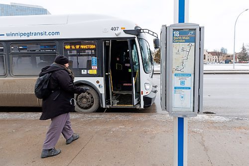 MIKE DEAL / WINNIPEG FREE PRESS
The Southbound Osborne at York bus stop Tuesday afternoon.
The city has apparently removed schedules from some bus stops and is posting QR codes instead. Some argue that hurts those who don&#x2019;t have phones or data. 
See Malak Abas story
240102 - Tuesday, January 02, 2024.