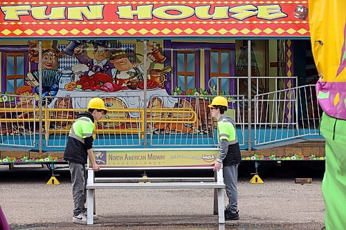 04062024
Workers were busy Tuesday setting up for the opening day of the Manitoba Summer Fair at the Keystone Centre grounds on Tuesday. The annual fair opens this afternoon and runs until Sunday. 
(Tim Smith/The Brandon Sun)