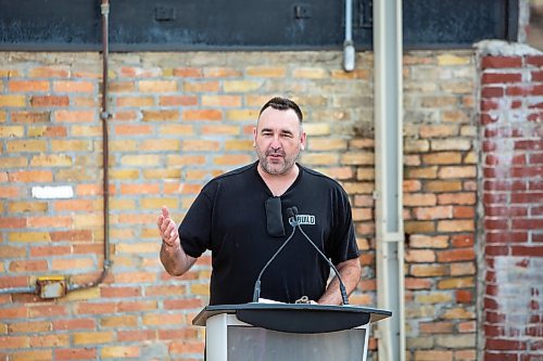 BROOK JONES / FREE PRESS
The Social Enterprise Centre which was founded in 2012 celebrated the 100th anniversary of the building that houses the organization in Winnipeg, Man., Tuesday, June 4, 2024. The former Canadian Pacific Railway Post Office Postal Station A building at 765 Main St. was built in 1924. Sean Hogan who is the president of SEC and executive director of BUILD Inc. is pictured talking about SEC during the celebration.