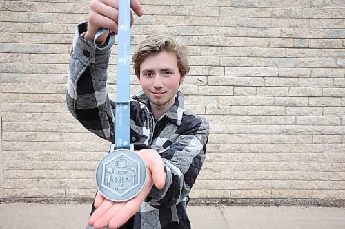 04062024
Mathew Kuszak, a grade 12 student at Crocus Plains Regional Secondary School, displays his Silver Medal for Autobody Repair, which he recently won at the 2024 Skills Canada National Competition in Qu&#xe9;bec City. (Tim Smith/The Brandon Sun)