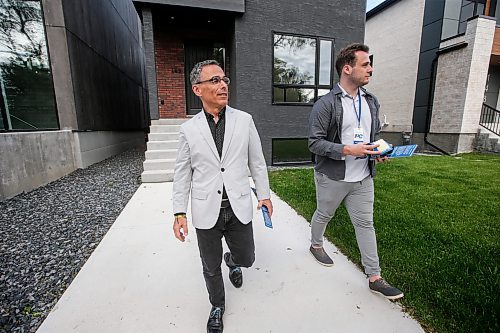 JOHN WOODS / FREE PRESS
Tuxedo by-election PC candidate Lawrence Pinsky, left, and a volunteer canvass on Renfrew Street for the upcoming election Tuesday, June 4, 2024. 

Reporter: carol