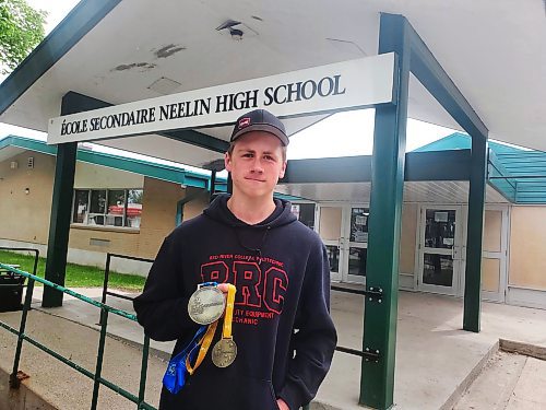 Neelin High School Grade 12 student Oliver Sawatsky poses with his RBC Best Region Award and Skills Canada gold medals in automobile technology on Tuesday. (Abiola Odutola/The Brandon Sun)