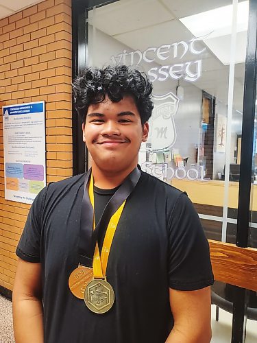 Vincent Massey High School Grade 11 student Miguel Manu Tarubal wears his Skills Manitoba and Skills Canada gold medals in architectural technology and design. (Abiola Odutola/The Brandon Sun)