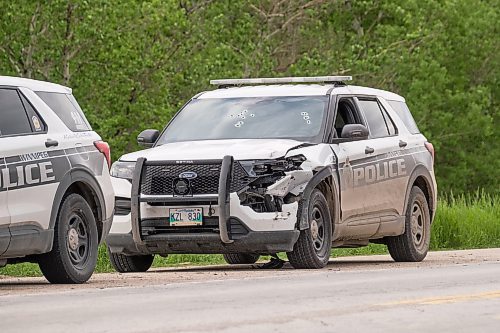 MIKE DEAL / FREE PRESS
A Winnipeg Police Service vehicle riddled with bullet holes sits on the side of Hwy 59 near the intersection of Provincial Road 305 near Niverville, MB.
240605 - Wednesday, June 05, 2024.