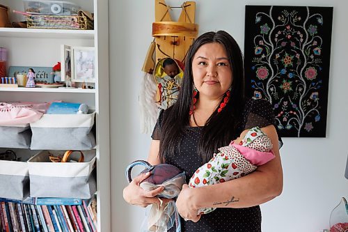 MIKE DEAL / FREE PRESS
Indigenous midwife Melissa Brown Sveinson in her home office with a handmade plush placenta and a doll swaddled in a traditional moss bag.
Melissa is part of a grassroots movement of Indigenous Midwives, Doulas, Aunties and Birth workers that are reconnecting Indigenous women with their language, medicines, and ceremonies to support families during pregnancy, birth and parenting.
See AV Kitching story
240604 - Tuesday, June 04, 2024.