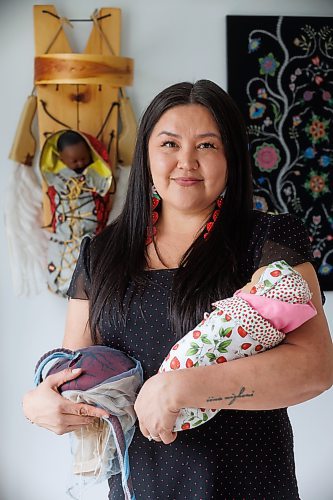 MIKE DEAL / FREE PRESS
Indigenous midwife Melissa Brown Sveinson in her home office with a handmade plush placenta and a doll swaddled in a traditional moss bag.
Melissa is part of a grassroots movement of Indigenous Midwives, Doulas, Aunties and Birth workers that are reconnecting Indigenous women with their language, medicines, and ceremonies to support families during pregnancy, birth and parenting.
See AV Kitching story
240604 - Tuesday, June 04, 2024.