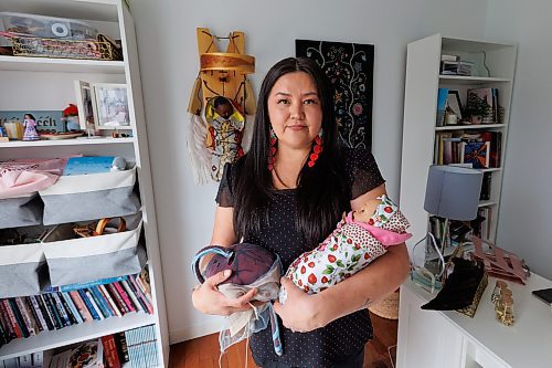 MIKE DEAL / FREE PRESS
Indigenous midwife Melissa Brown Sveinson in her home office with a handmade plush placenta and a doll swaddled in a traditional moss bag.
Melissa is part of a grassroots movement of Indigenous Midwives, Doulas, Aunties and Birth workers that are reconnecting Indigenous women with their language, medicines, and ceremonies to support families during pregnancy, birth and parenting.
See AV Kitching story
240604 - Tuesday, June 04, 2024.