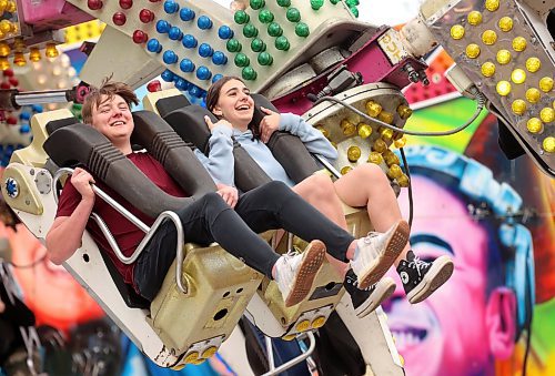 05062024
Loughlan McMullan and Veronika Hrytsenko ride the Re-Mix on the midway during the opening evening of the Manitoba Summer Fair at the Keystone Centre on Wednesday. The fair runs until Sunday.
(Tim Smith/The Brandon Sun)