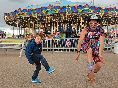 05062024
Seven-year-old Parker Flett dances with performer Spandy Andy during the opening evening of the Manitoba Summer Fair at the Keystone Centre on Wednesday. The fair runs until Sunday.
(Tim Smith/The Brandon Sun)