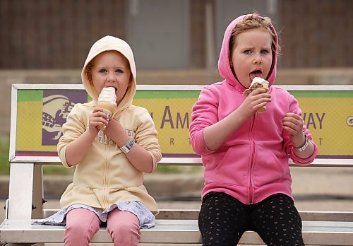 05062024
Sisters Claire and Madisyn Sedgwick enjoy ice cream during the opening evening of the Manitoba Summer Fair at the Keystone Centre on Wednesday. The fair runs until Sunday.
(Tim Smith/The Brandon Sun)