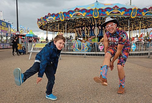 05062024
Seven-year-old Parker Flett dances with performer Spandy Andy during the opening evening of the Manitoba Summer Fair at the Keystone Centre on Wednesday. The fair runs until Sunday.
(Tim Smith/The Brandon Sun)