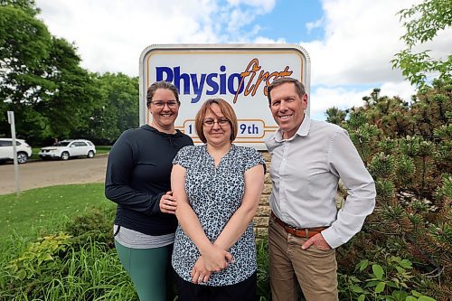 Sarah Hall, Kelly Kufus and Doug Treloar from Physiofirst are three of the volunteers who will be participating in the clinic's Food First food drive this Saturday. Locals can drop off donations of food and toiletries at four locations around the city. (Colin Slark/The Brandon Sun)