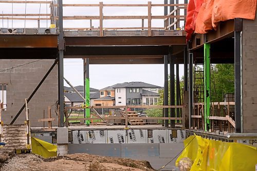 Mike Sudoma/Free Press
The skeleton of a new K-8 school in the Sage Creek neighbourhood frames a group of newly built houses in the distance.
June 6, 2024