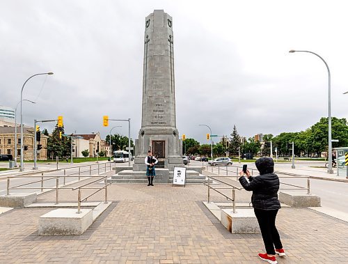 MIKE DEAL / FREE PRESS
Ethan Blain, Pipe Major of the Lord Selkirk Robert Fraser Memorial Pipe Band, in front of the Cenotaph on Memorial Boulevard, performs with his bagpipes in memory of the Normandy Landings of D-Day that took place 80 years ago on June 6th, 1944. 
240606 - Thursday, June 06, 2024.