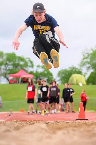 Mike Sudoma/Free Press
Jr Varsity Long Jump participant Grant Austin competes in the Dairy Farmers of Manitoba Provincial Track and Field Championship for Birtle Collegiate Thursday afternoon
June 6, 2024