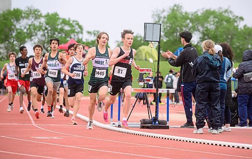Mike Sudoma/Free Press
Carter Heroux from College Beliveau leads the Junior Varsity 1500 meter run event at the Dairy Farmers of Manitoba Provincial Track and Field Championship Thursday afternoon
June 6, 2024