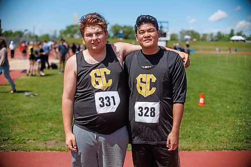 MIKE DEAL / FREE PRESS
Alex Logan (left) and Isaiah Imperial (right), members of the Garden City Collegiate Para Track Team, at the Manitoba Provincial Track and Field Championships Friday.
240607 - Friday, June 07, 2024.