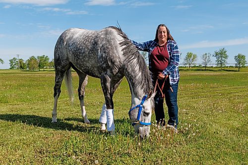 MIKE DEAL / FREE PRESS
Explosive with trainer Lise Pruitt at Assinboia Downs Friday morning.
See George Williams story
240607 - Friday, June 07, 2024.