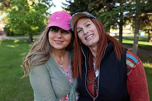 07062024
Anastasia Jane Gibson and Wendy Deanne Friesen pose for photos after their wedding dress rehearsal at Rideau Park on Thursday evening. The couple will be getting married as part of Pride in the Park following the Pride March on Saturday, June 15th. The wedding is part of Brandon Pride&#x2019;s celebration of 20 years of legalized same sex marriage in Manitoba. 
(Tim Smith/The Brandon Sun)