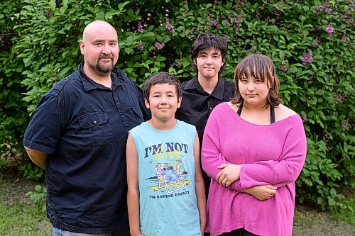 Mike Sudoma/Free Press
Sunshine Fund recipients Raymond Harvey (left) and his children (left to right) Xander Tally and Aury Friday evening
June 7, 2024