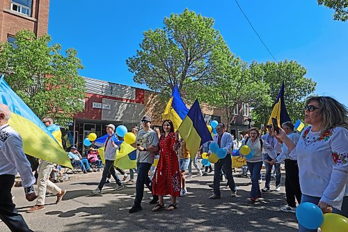 Members of the Ukrainian-Canadian Association of Brandon represented their culture with their traditional style of dress at the Travellers' Parade on Saturday. (Charlotte McConkey/The Brandon Sun)