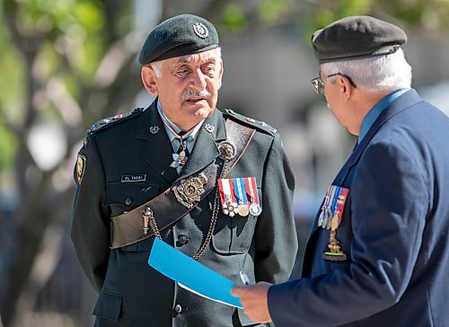 BROOK JONES / FREE PRESS
The Royal Winnipeg Rifles Association host an 80th D-Day anniversary ceremony at Vimy Ridge Park in Winnipeg, Man., Saturday, June 8, 2024. Pictured: Lt.-Col. Albert EL Tassi (left) talks with retired Col. Robert Poirier prior to the start of the commemoration ceremony.