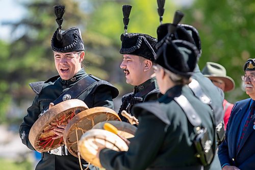 BROOK JONES / FREE PRESS
The Royal Winnipeg Rifles Association host an 80th D-Day anniversary ceremony at Vimy Ridge Park in Winnipeg, Man., Saturday, June 8, 2024. Pictured: Warrant Officer Robert-Falcon Ouellette (far left) leads members of the Warriors of the Royal Winnipeg Rifles Association Regimental Band as they perform a thank you warrior song during the commemorative ceremony.