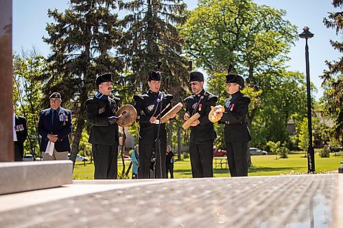 BROOK JONES / FREE PRESS
The Royal Winnipeg Rifles Association host an 80th D-Day anniversary ceremony at Vimy Ridge Park in Winnipeg, Man., Saturday, June 8, 2024. Pictured: Members of the Warriors from the Royal Winnipeg Rifles Association Regimental Band perform during the commemorative ceremony as a monument in honour of the Royal Winnipeg Rifles appears in the foreground.