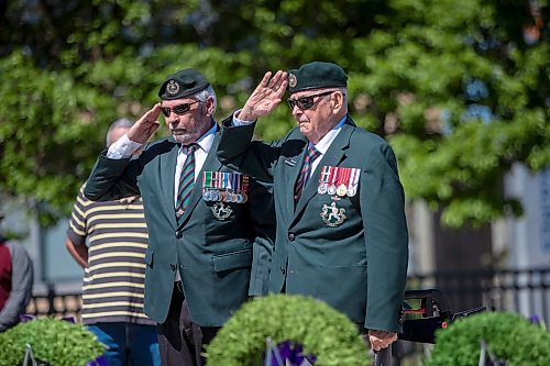 BROOK JONES / FREE PRESS
The Royal Winnipeg Rifles Association host an 80th D-Day anniversary ceremony at Vimy Ridge Park in Winnipeg, Man., Saturday, June 8, 2024. Pictured: Retired Maj. Richard Desjardins (left), who is also the president of the RWRA, and retired warrant officer second class Robert Geddess do a military hand salute after laying a wreath on behalf of veterans organizations, the RWFA, during the commemoration ceremony.