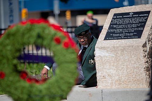 BROOK JONES / FREE PRESS
The Royal Winnipeg Rifles Association host an 80th D-Day anniversary ceremony at Vimy Ridge Park in Winnipeg, Man., Saturday, June 8, 2024. Pictured: Retired Cpl. Alin Parent sits next to a Royal Winnipeg Rifles Memorial during the commemoration ceremony.