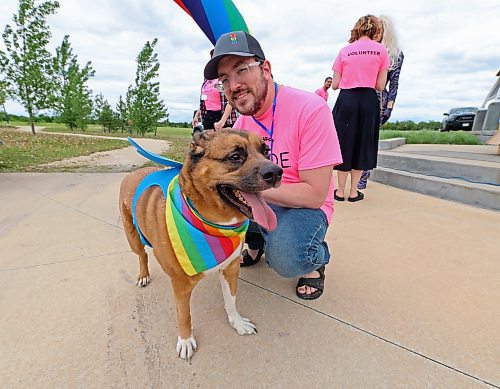 Kala is this year's pooch pride grand marshall, pictured here with her human Ian Ternovetsky, vice-chairperson of Brandon Pride. (Charlotte McConkey/The Brandon Sun)