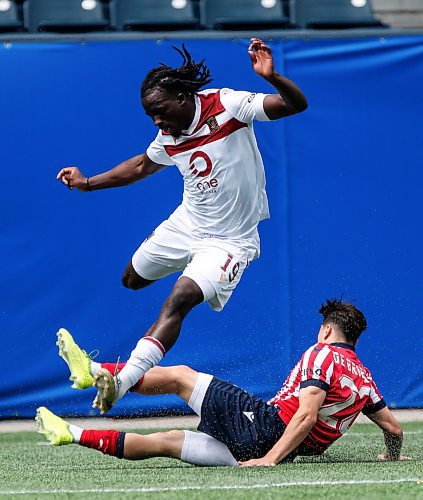 JOHN WOODS / FREE PRESS
Atl&#xe9;tico Ottawa&#x2019;s Matteo Camillo Paul de Brienne (22) defends against Valour FC&#x2019;s Abdul Wahid Binate (19) during first half CPL action in Winnipeg Sunday, June 9, 2024. 

Reporter: ?