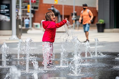 MIKAELA MACKENZIE / FREE PRESS

Three-year-old Jaylynn (no last name given) plays in the water feature at True North Square on Monday, June 10, 2024.

Standup.

