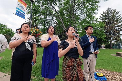 Mariane Nadala leads a rendition of the Philippine national anthem "Lupang Hinirang" during a flag-raising event at Brandon City Hall on Tuesday morning. (Colin Slark/The Brandon Sun)