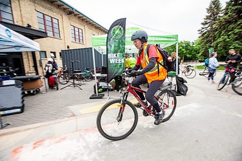 MIKAELA MACKENZIE / FREE PRESS

Dean Scaletta cycles away from the MPI all-day bike to work day pit stop at The Forks on Tuesday, June 11, 2024.

Standup.

