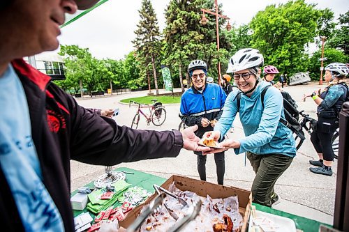 MIKAELA MACKENZIE / FREE PRESS

Heidi Reimer-Epp and her dad, Ken Reimer, stop by the MPI all-day bike to work day pit stop at The Forks on Tuesday, June 11, 2024.

Standup.

